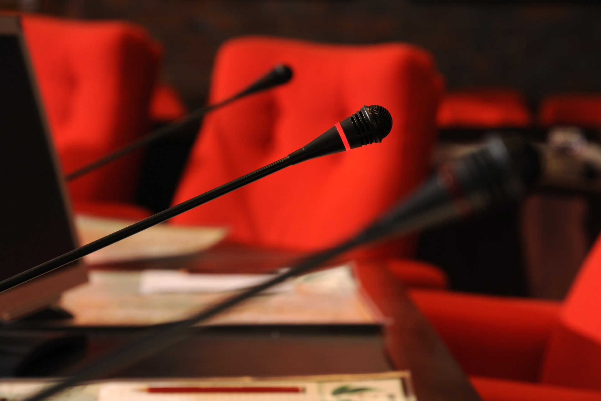 microphone, red chair, council chambers