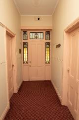 View of the entrance door from inside of the Falls Farm house located in Lesmurdie