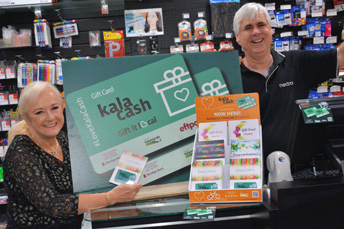 Mayor Thomas was the first to purchase a ‘Kala Cash’ gift card